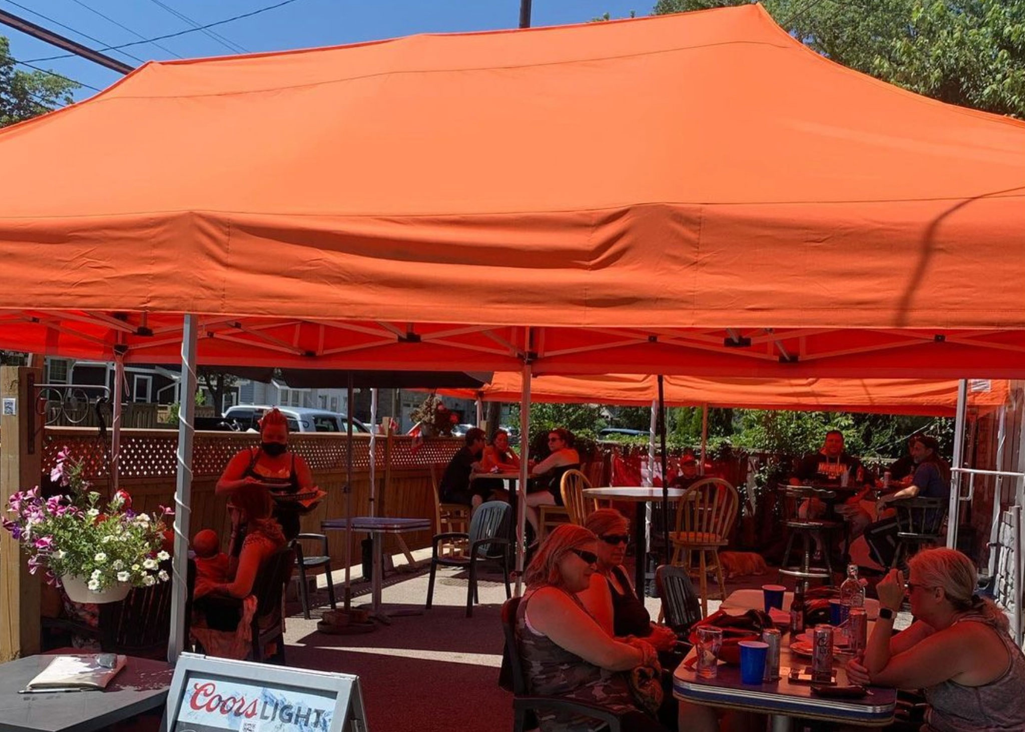 outdoor alfresco dining area covered by gazebo