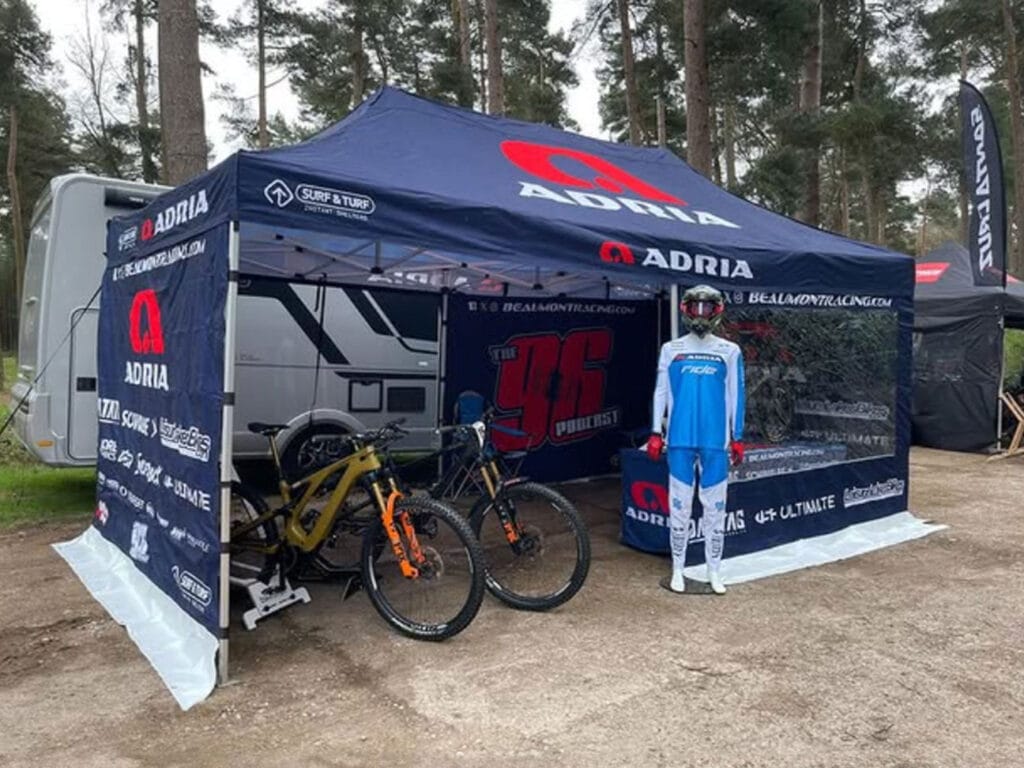 Custom branded 6x3m gazebo by Surf & Turf for a mountain bike sporting team.