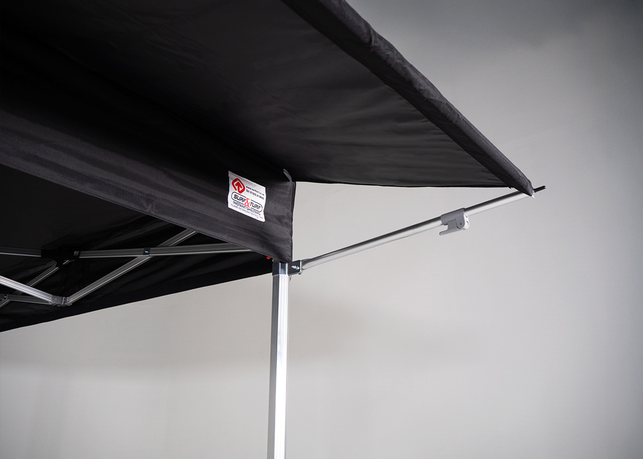 close up photo of a surf & turf instant shelters gazebo with a rain awning attachment